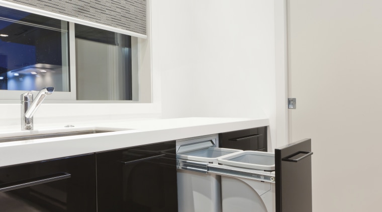 View of hideaway bin in kitchen with light architecture, floor, interior design, kitchen, room, sink, white