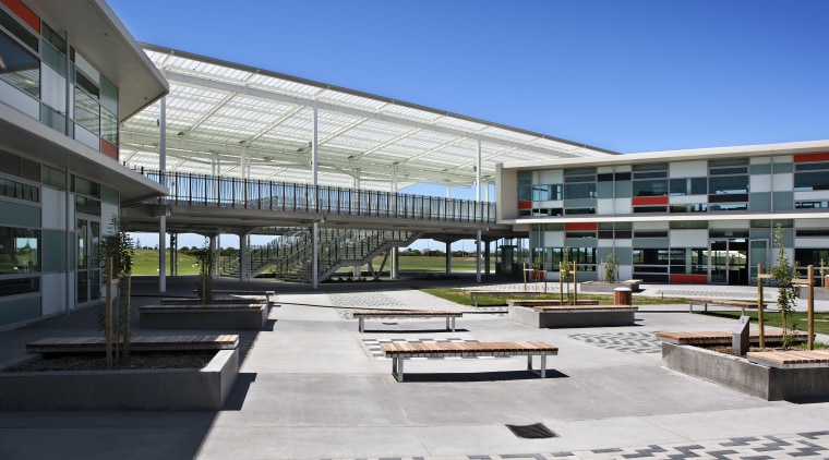 View of courtyard with seating. - View of architecture, building, commercial building, corporate headquarters, metropolitan area, mixed use, real estate, residential area, urban design