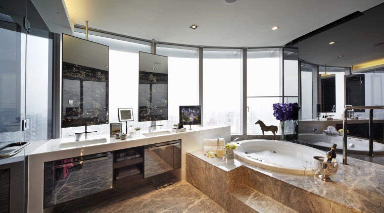 View of the bathroom.  The tiling is countertop, estate, interior design, kitchen, real estate, room, gray