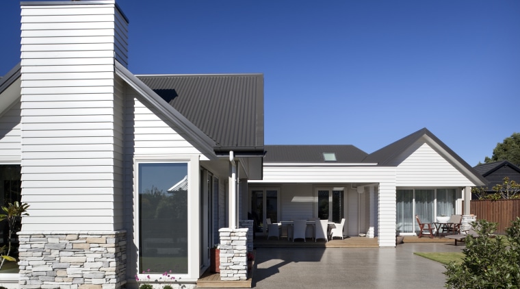 View of exterior with light toned cladding and elevation, facade, home, house, property, real estate, residential area, roof, siding, blue