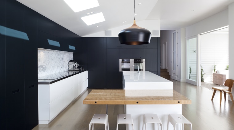 The addition accommodating the kitchen, dining and living architecture, countertop, dining room, house, interior design, kitchen, room, table, white, black
