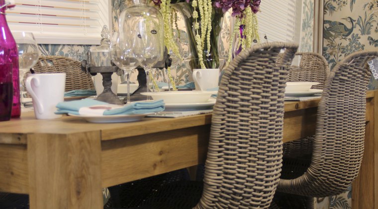 Some of the offerings at the Guthrie Bowron chair, dining room, floor, flooring, furniture, home, interior design, living room, table, tablecloth, wood, brown