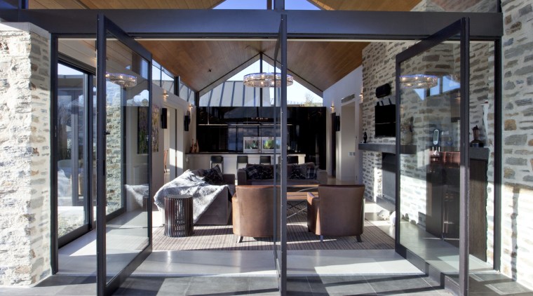 pointed timber roof, dark coloured fabrics in living architecture, floor, flooring, house, interior design, patio, gray, brown