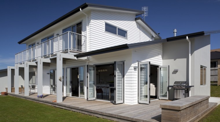 The Palliside weatherboard cladding system provides a clean, building, elevation, estate, facade, home, house, official residence, property, real estate, residential area, siding, villa, window, gray, blue