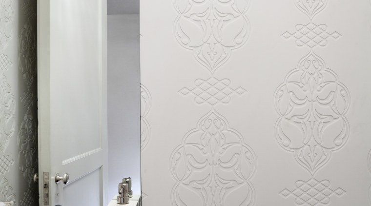 Custom-designed and fabricated Glacier White Corian clads every bathroom, ceramic, floor, flooring, interior design, plaster, plumbing fixture, product design, room, tap, tile, wall, white, gray