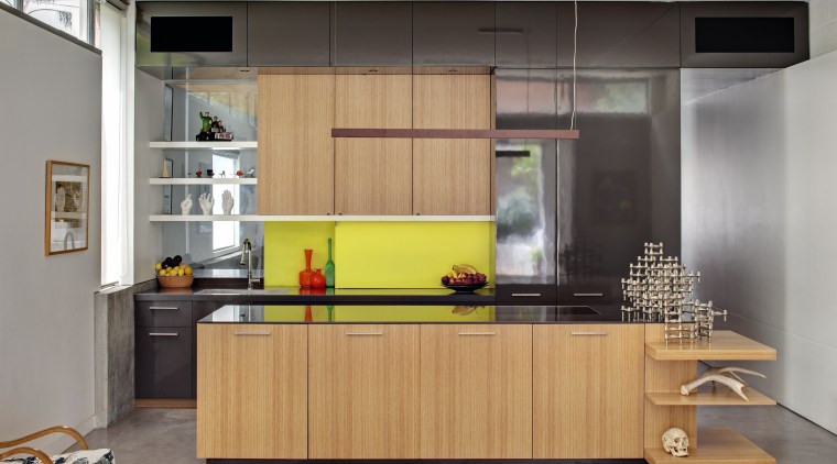 Above left: A vibrant yellow splashback provides a cabinetry, countertop, furniture, interior design, kitchen, gray