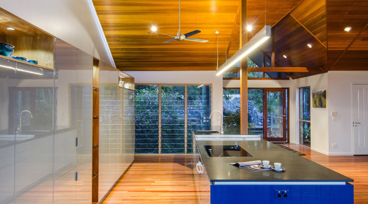 Strong architectural lines define this new kitchen. The architecture, ceiling, floor, flooring, house, interior design, brown