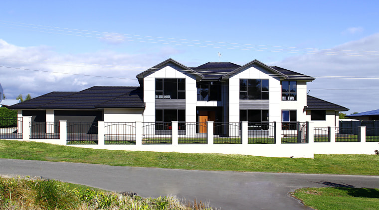 This home won the Registered Master Builders House building, cottage, elevation, estate, facade, farmhouse, home, house, land lot, neighbourhood, property, real estate, residential area, sky, suburb, teal