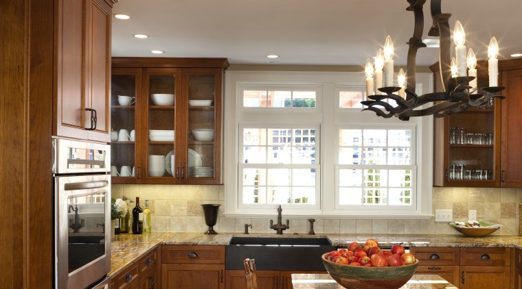 The rear entrance to this Federal Kitchen has cabinetry, countertop, cuisine classique, hardwood, interior design, kitchen, room, brown, gray