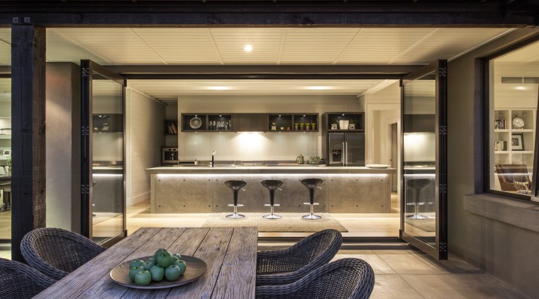 This contemporary, well-balanced masonry home was designed and interior design, real estate, black, brown, orange