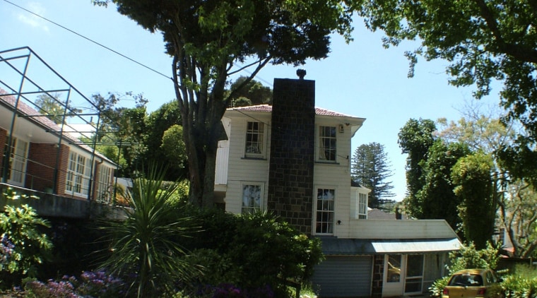 In this before image, there is a small architecture, building, cottage, estate, home, house, mansion, neighbourhood, plant, property, real estate, residential area, tree, villa, black