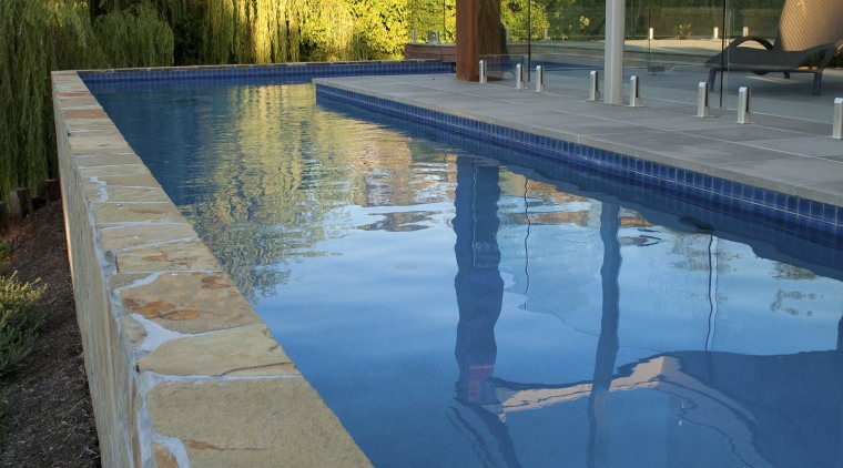 pool view Transformation  reinvented residence by Graeme backyard, house, leisure, outdoor structure, plant, real estate, reflection, swimming pool, water