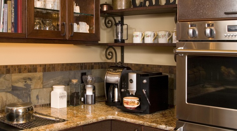 The scullery in this traditional wood kitchen includes cabinetry, countertop, cuisine classique, home appliance, interior design, kitchen, kitchen organizer, room, brown