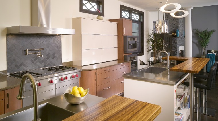 The dramatic grain in the zebrano wood in cabinetry, countertop, cuisine classique, home, interior design, kitchen, real estate, room, gray
