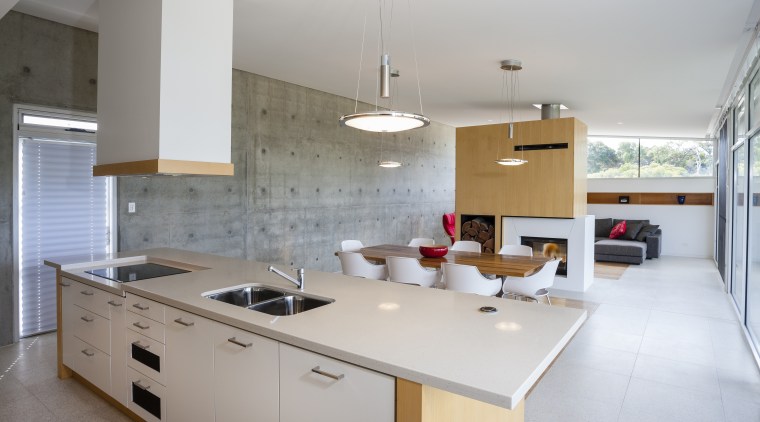 A predominently white kitchen island, with hanging extractor architecture, countertop, cuisine classique, interior design, kitchen, real estate, room, gray