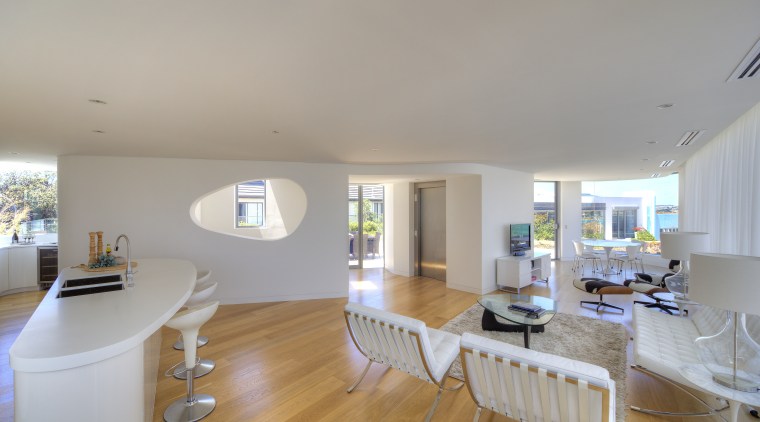 A two-tone colour scheme in this penthouse apartment apartment, architecture, ceiling, daylighting, dining room, estate, floor, home, house, interior design, living room, property, real estate, room, table, window, gray