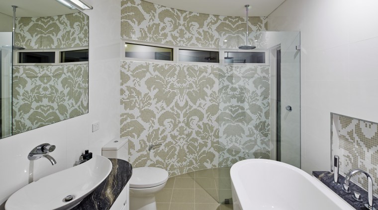 Every room receives the same close attention to bathroom, floor, flooring, home, interior design, property, real estate, room, tile, wall, window, gray