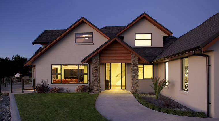 Design and build by Fowler Homes Taranaki - building, cottage, elevation, estate, facade, home, house, lighting, property, real estate, residential area, roof, siding, sky, window, blue