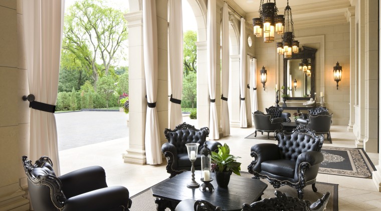 Entry to this Italianate house is through the furniture, home, interior design, living room, room, window, white