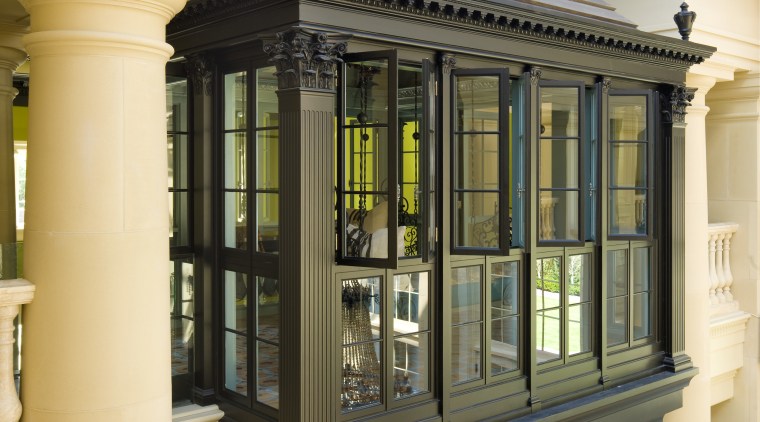 A suspended room in the salon in this baluster, building, column, facade, structure, window, orange, brown