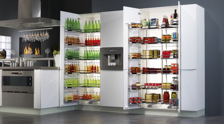 All the items stored in a Kessebohmer Tandem display case, product, refrigerator, shelf, shelving, gray, white, black