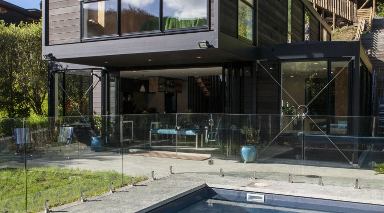 On the surface  Resene CoolColour - On architecture, estate, facade, home, house, property, real estate, reflection, residential area, swimming pool, villa, window, teal