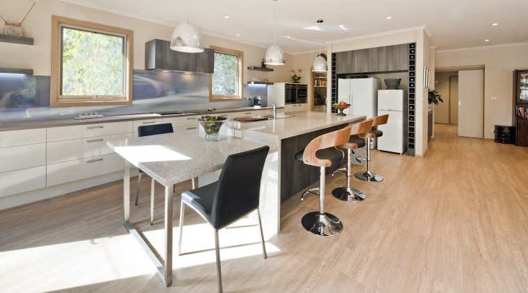 It's what's behind the scenes that determines the countertop, floor, flooring, hardwood, interior design, kitchen, laminate flooring, property, real estate, room, wood, wood flooring, gray