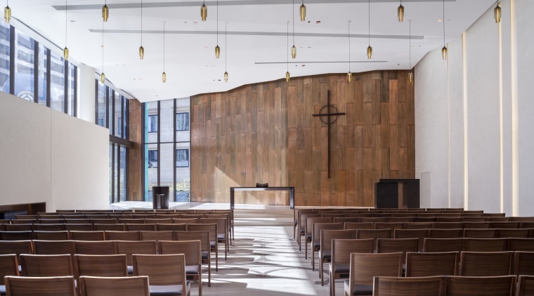 A copper wall features on the inside of architecture, auditorium, conference hall, furniture, interior design, gray