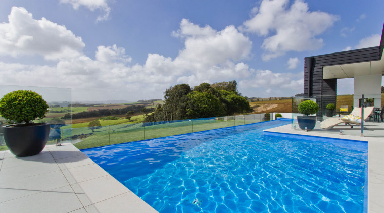 Infinity pool for country house by Mayfair Pools. estate, home, house, leisure, property, real estate, resort, sky, swimming pool, villa, water, gray