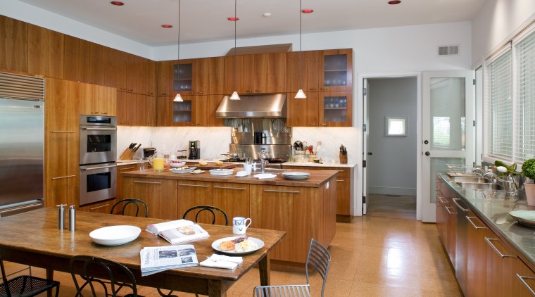 Cherry wood cabinetry wraps around the perimeter of cabinetry, ceiling, countertop, cuisine classique, interior design, kitchen, real estate, room, gray, brown