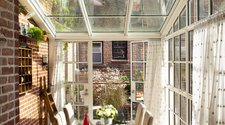 This kitchen in a Federal-style townhouse opens to daylighting, home, house, interior design, orangery, outdoor structure, patio, porch, roof, window, brown, white
