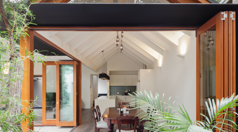 Reminiscent of a Japanese courtyard house, this house architecture, backyard, cottage, facade, home, house, outdoor structure, property, real estate, siding, yard, white