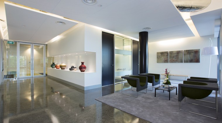 To create a cost-effective reception area for Staples architecture, ceiling, floor, interior design, lobby, real estate, gray