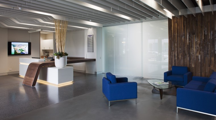 This boutique office development on a brownfields site architecture, ceiling, floor, flooring, furniture, interior design, lobby, office, real estate, table, gray