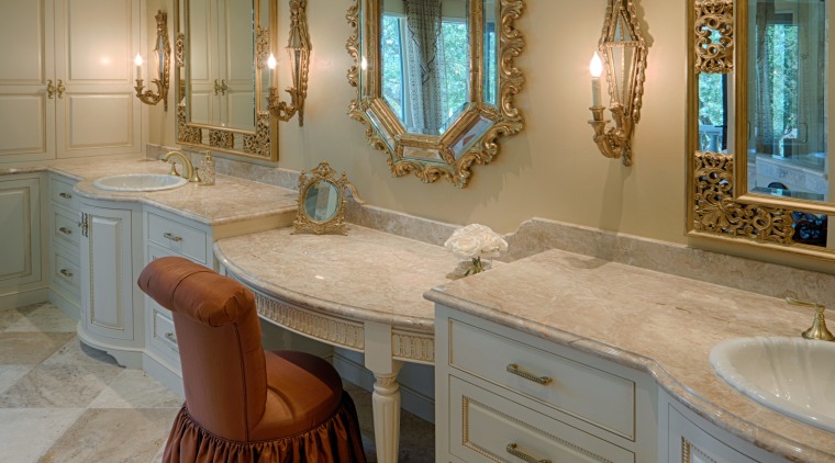 Owner-designer Terri Miller specified three decorative mirrors, with bathroom, cabinetry, ceiling, countertop, estate, floor, flooring, home, interior design, room, gray, brown