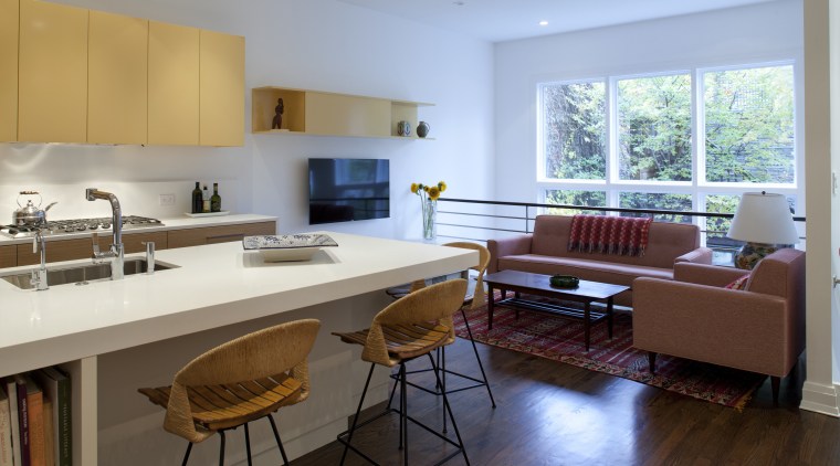 In this kitchen by architect William Massey, while countertop, floor, flooring, interior design, kitchen, living room, real estate, room, table