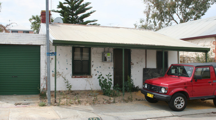 Before renovation the render on this cottage covered automotive exterior, car, family car, home, house, luxury vehicle, property, real estate, roof, shed, vehicle, white