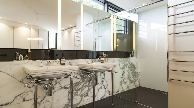 A marble-lined bathroom with steel-framed basins is a architecture, countertop, floor, flooring, interior design, product design, room, gray