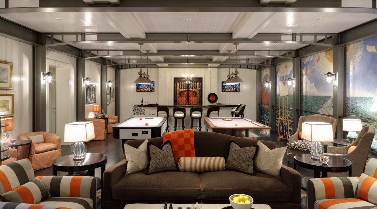 The main room features substantial metal wall and interior design, living room, gray, black