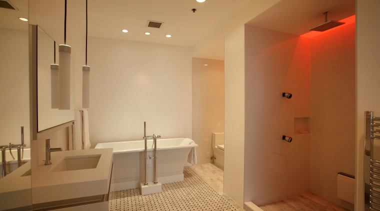 Red, green, blue the shower offers chromatherapy, architecture, bathroom, ceiling, floor, flooring, home, interior design, lighting, real estate, room, brown, orange