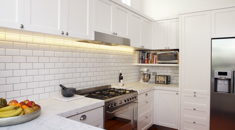 Absola Stone crafted and installed the Ultra Bianco countertop, floor, flooring, house, interior design, kitchen, room, white