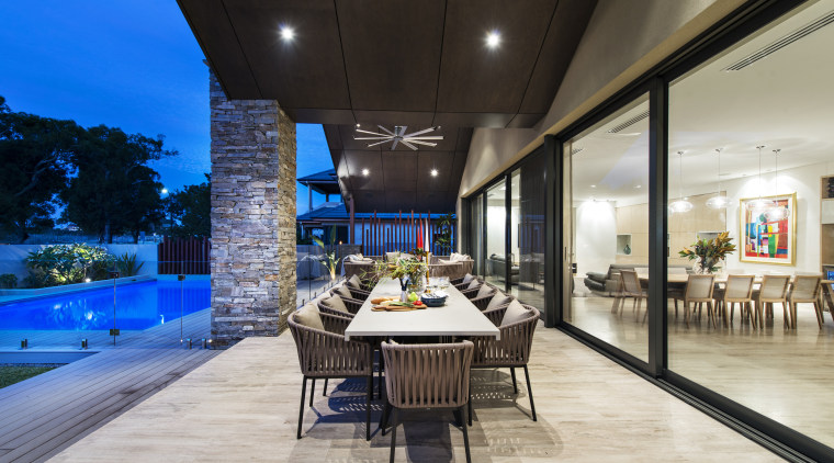 Alfresco dining area of expansive indoor-outdoor entertaining space estate, interior design, real estate, gray, black
