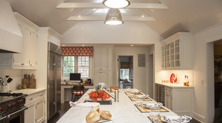 There is also a home office area beside ceiling, countertop, cuisine classique, home, interior design, kitchen, living room, real estate, room, window, gray, brown