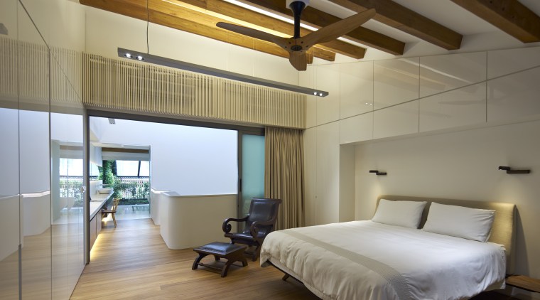 The master suite of this remodelled Singapore shophouse architecture, bedroom, ceiling, daylighting, floor, interior design, real estate, room, suite, wood, brown, gray