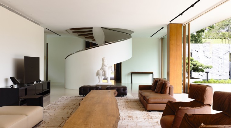 This entry to a room on the lower architecture, ceiling, house, interior design, living room, real estate, room, table, white