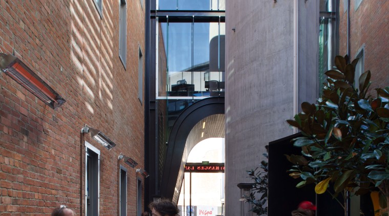 Contemporary commercial building in Christchurch with laneway bars alley, apartment, architecture, building, city, facade, house, neighbourhood, road, street, town, window, gray, black