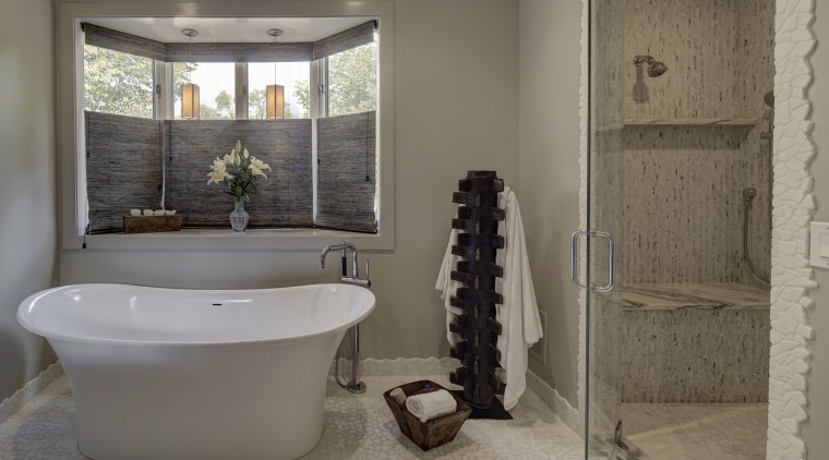 Textural white rock features on the floor of bathroom, floor, flooring, home, interior design, plumbing fixture, room, tile, window, gray