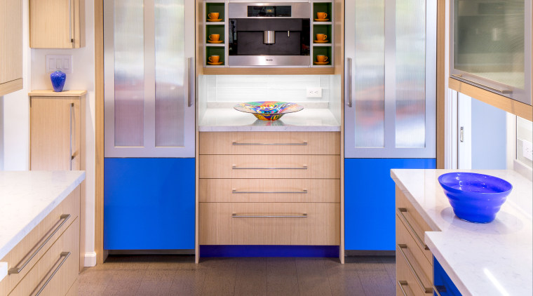 In this colorful kitchen, twin columns accommodating a cabinetry, countertop, home appliance, interior design, kitchen, room, white