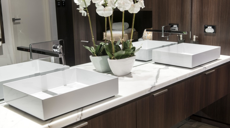 Contemporary thin-walled rectangular basins provide a crisp counterpoint coffee table, countertop, furniture, interior design, product design, sink, table, tap, black, white