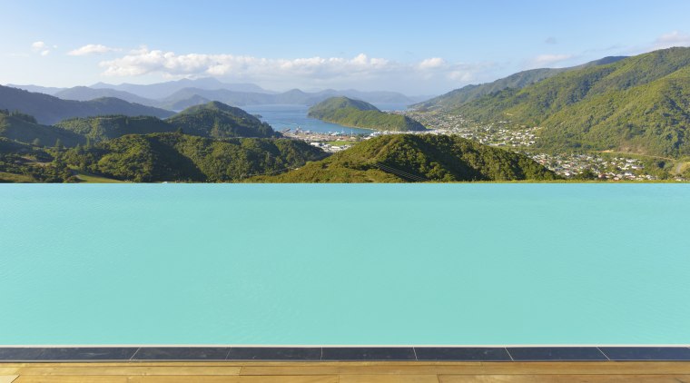 This 25m x 6m swimming pool, built by lake, landscape, mountain, mountain range, nature, reservoir, sky, water, water resources, teal